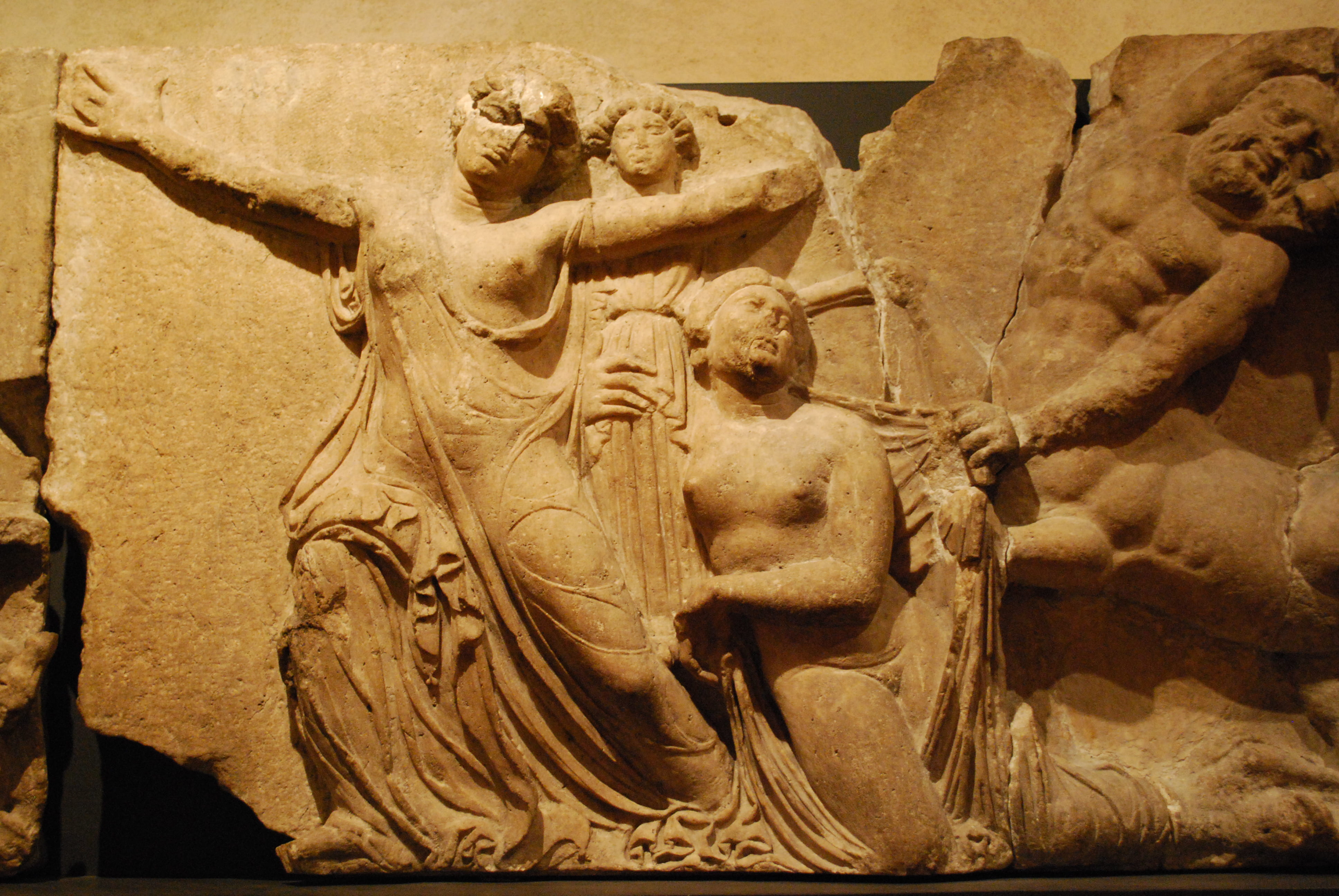 Women with cult statue of Artemis being accosted by centaur